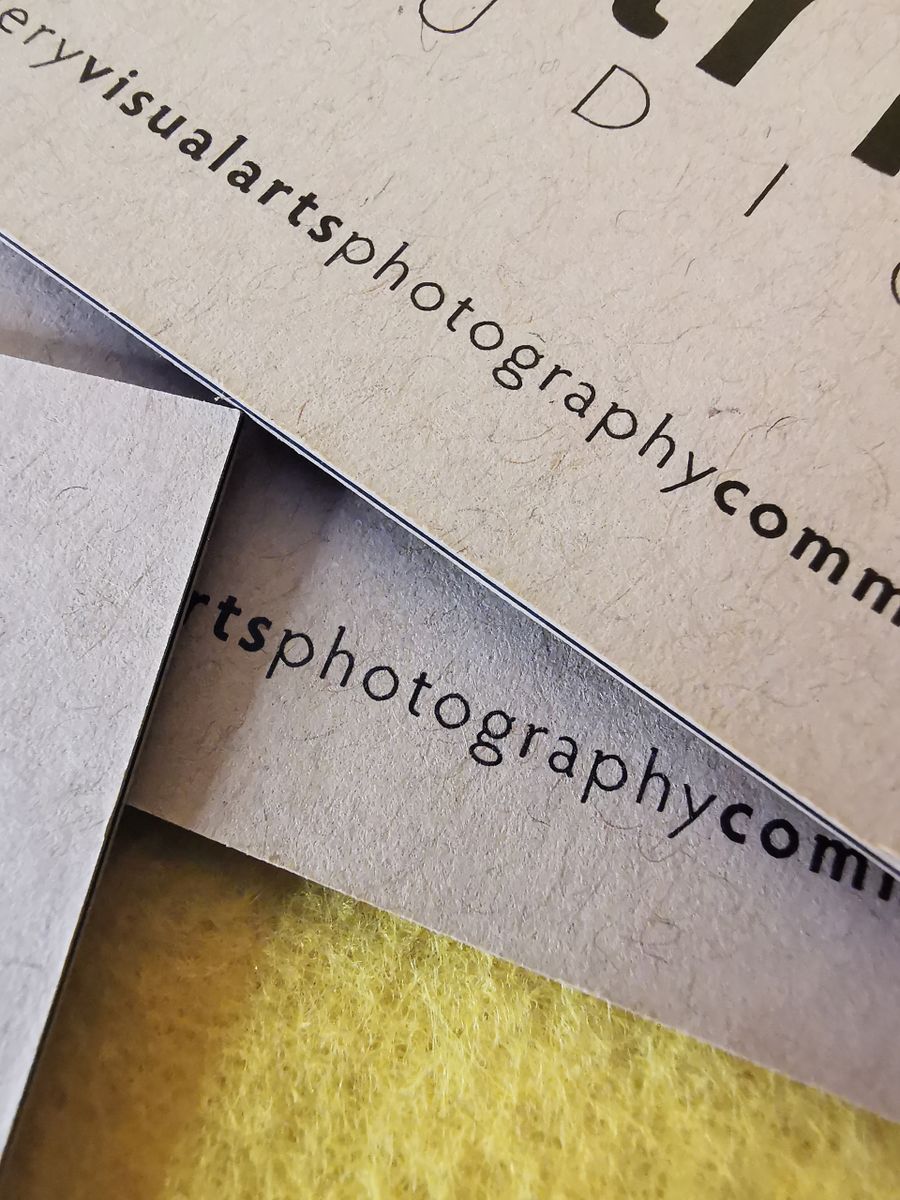 Textured printed business cards fanned out