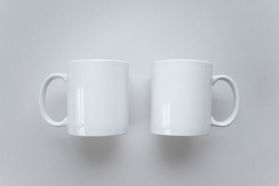Plain white ceramic mugs ready for branding